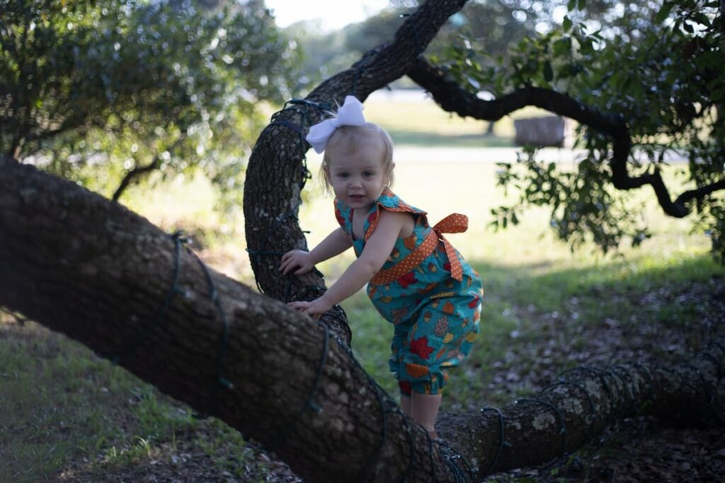 Young Child In A Tree 1200x800